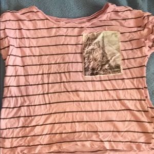 Purple strived T-shirt.